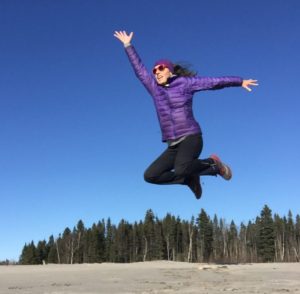 Jumping for joy next to the Churchill River